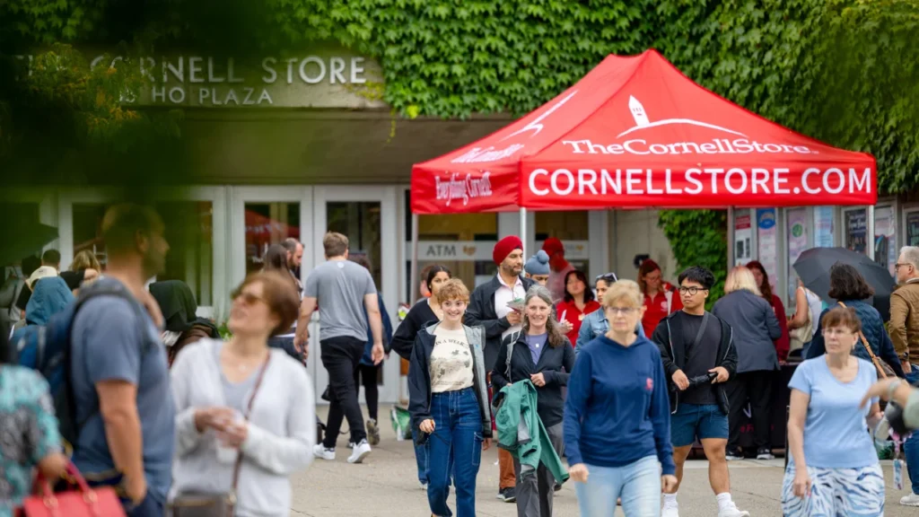 Shopper In Front of The Cornell Store - The Cornell Store Hours