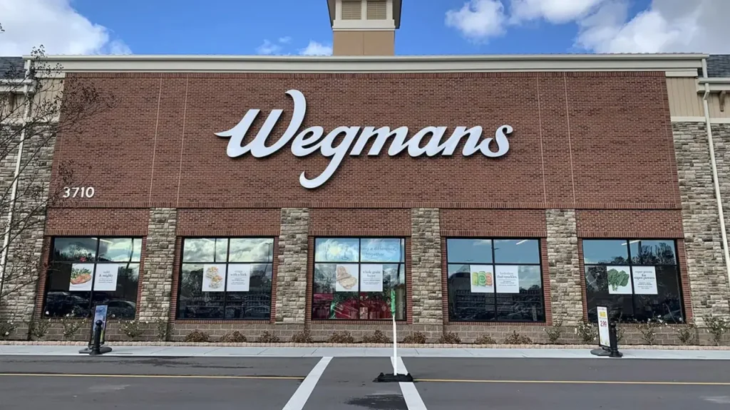 Wegmans Store with A Partly Cloudy Sky Overhead- Wegmans Liquor Store Hours