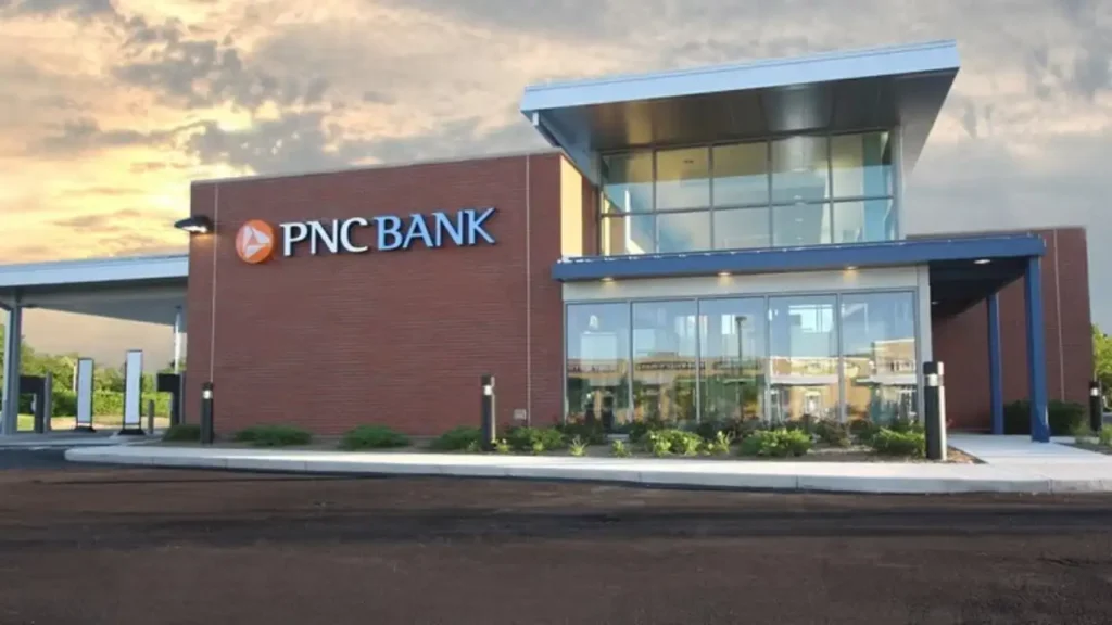 PNC Bank Branch Building with A Red Brick Facade and Large Glass Windows - PNC Bank Hours